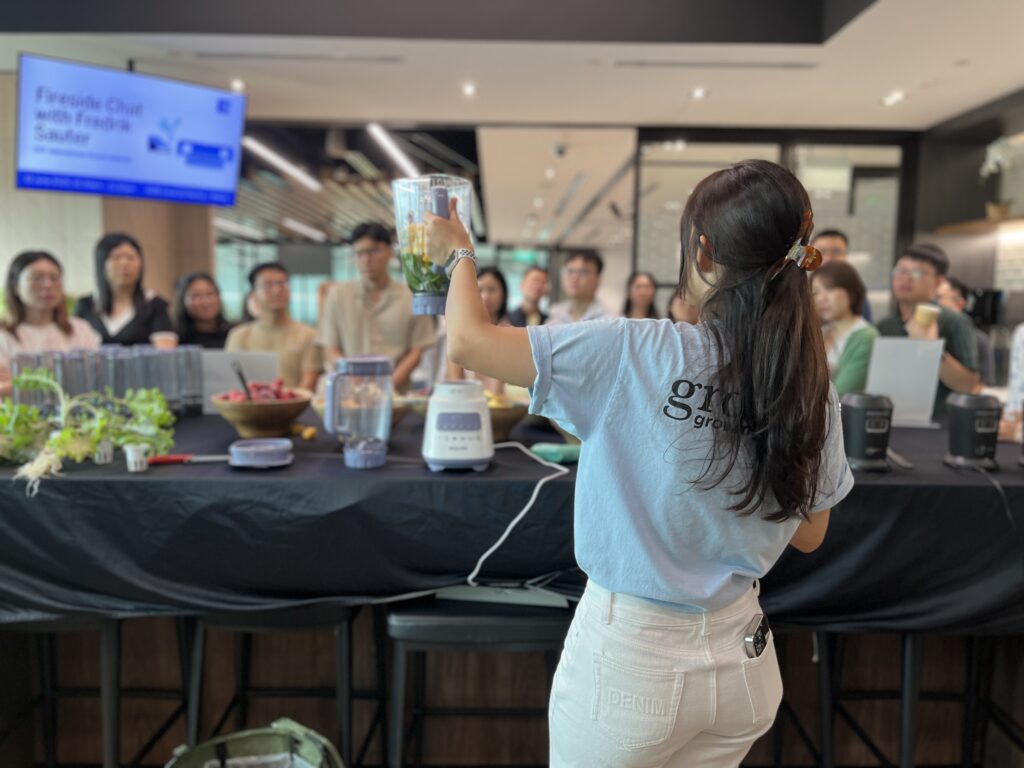 Grace hosting team building smoothie workshop at AMEX